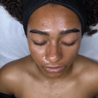 A client relaxing during a glow-focused facial at Élevé by Elika Peka