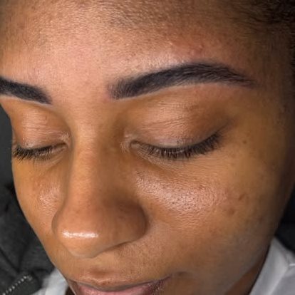 Close-up of polished brows and luminous skin at the studio